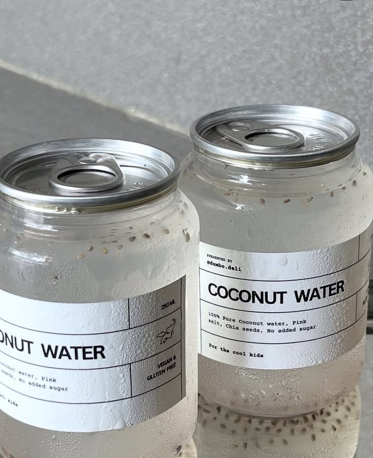 Clear cans with custom printed sticker labels